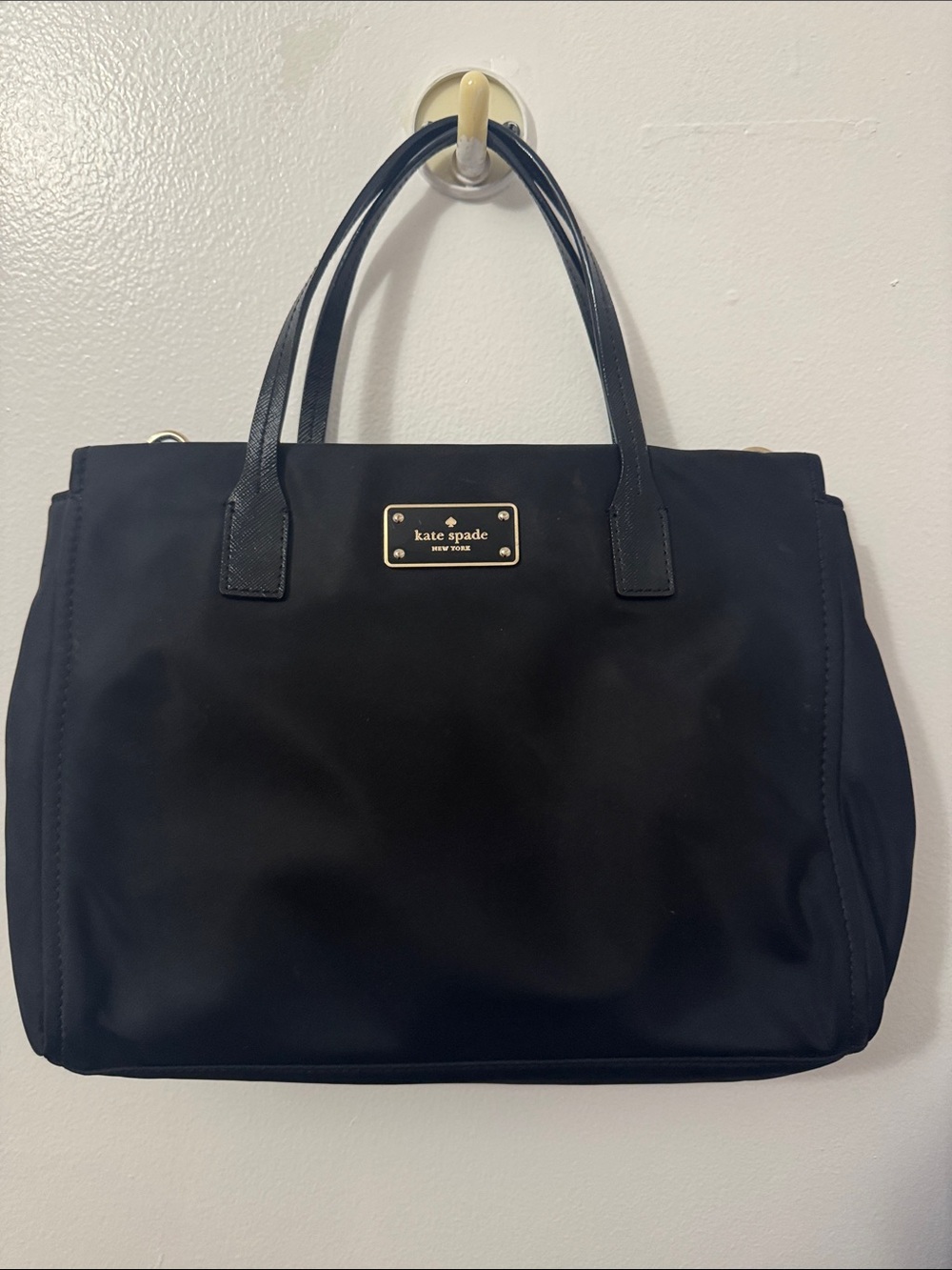 kate spade black nylon tote with gold logo plaque